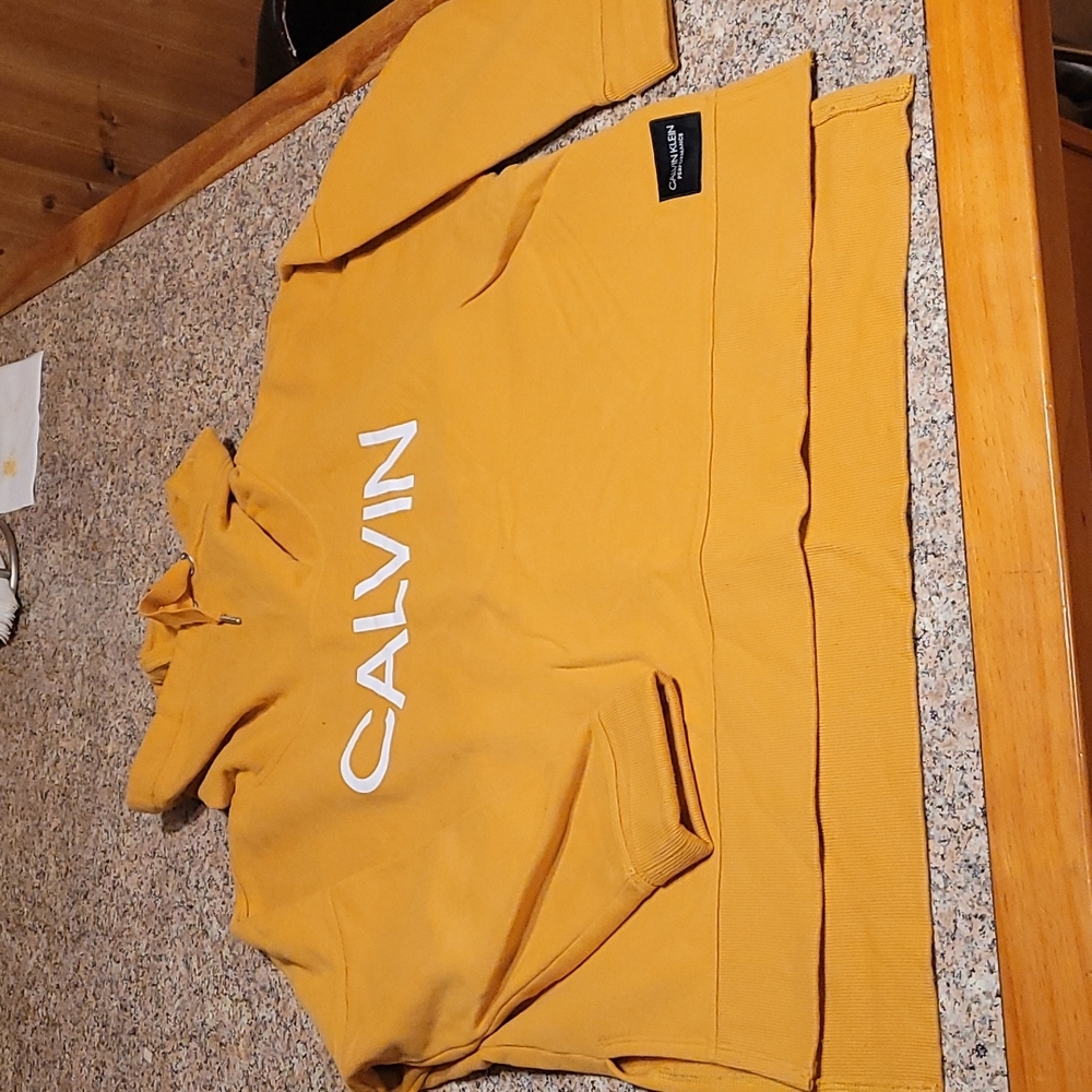 Gold Calvin Klein sweatshirt